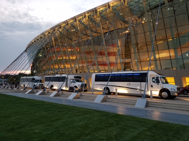 Travelers boarding a shuttle at Kansas City Airport Transportation