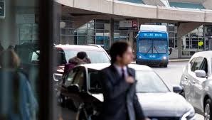 Kansas City Airport Transportation shuttle picking up passengers